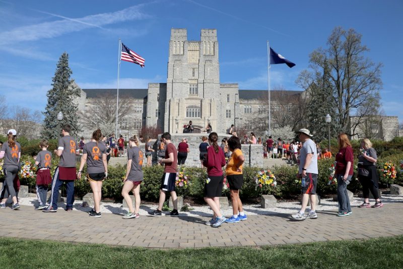 Participants pass the April 16 Memorial during the 2018 Run in Remembrance.